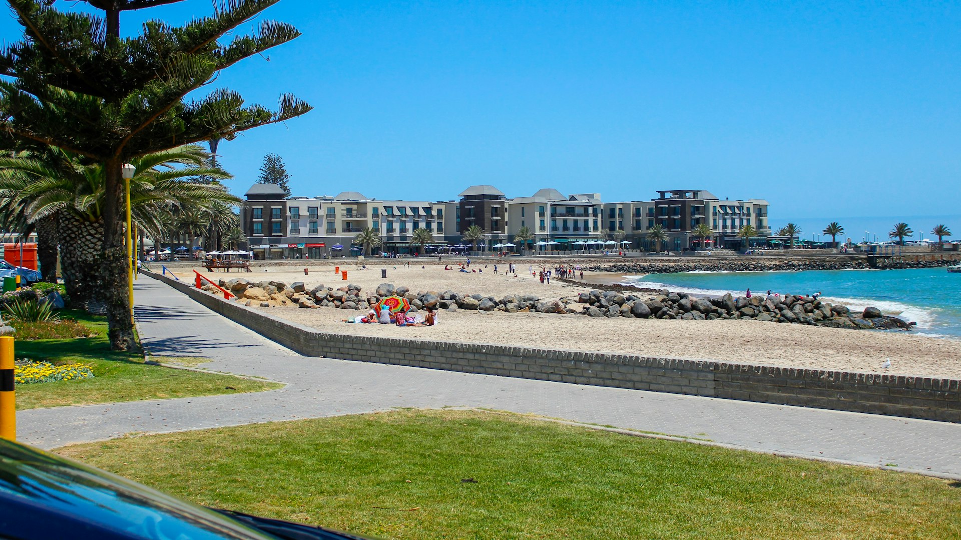 a view of a beach from a car window